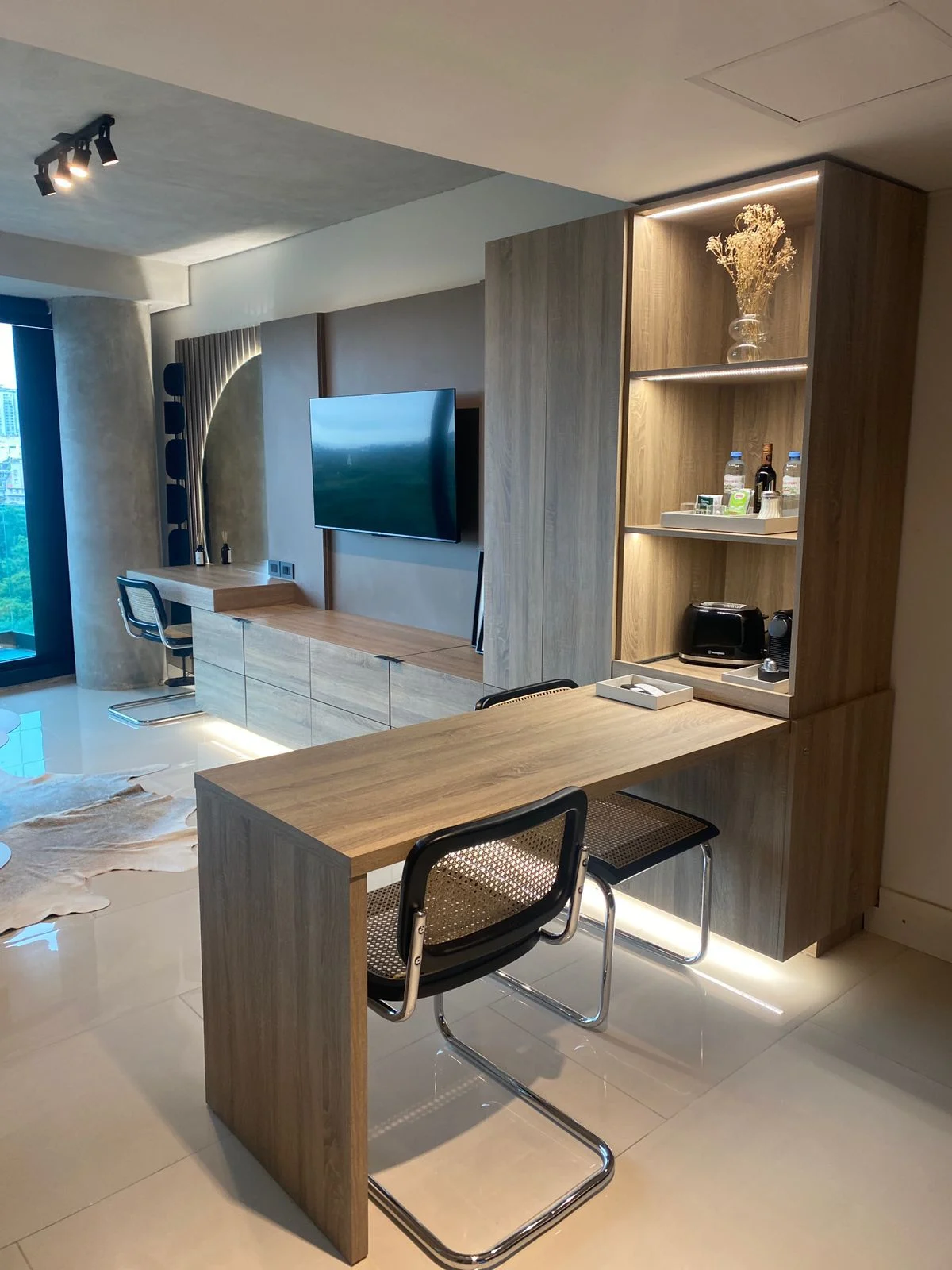 Wooden desk and shelving in Luxury