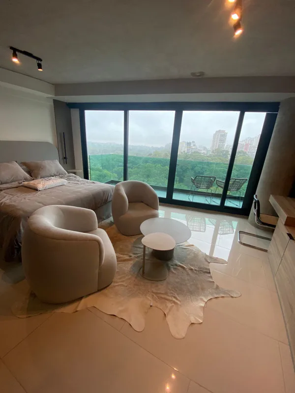 Luxury living space opening towards the green view