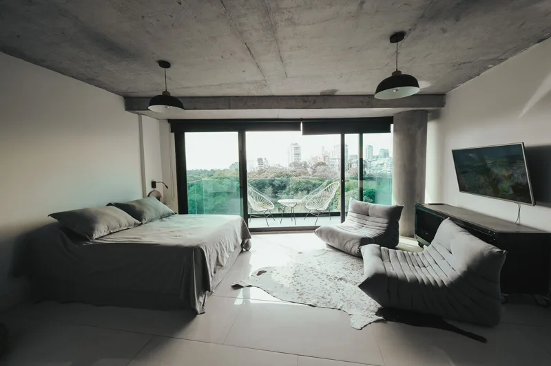 Premium sleeping and living areas beside large windows